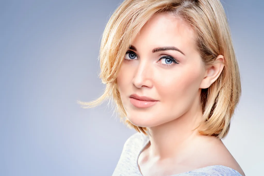 Female with Blue Eyes and Short Blond Hair